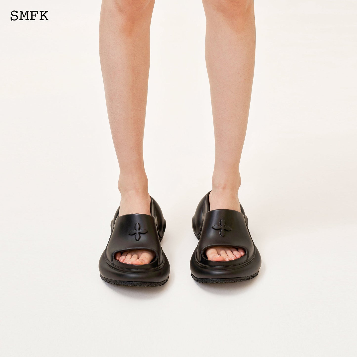 Compass Wave High Heel Bumper Sandal In Black