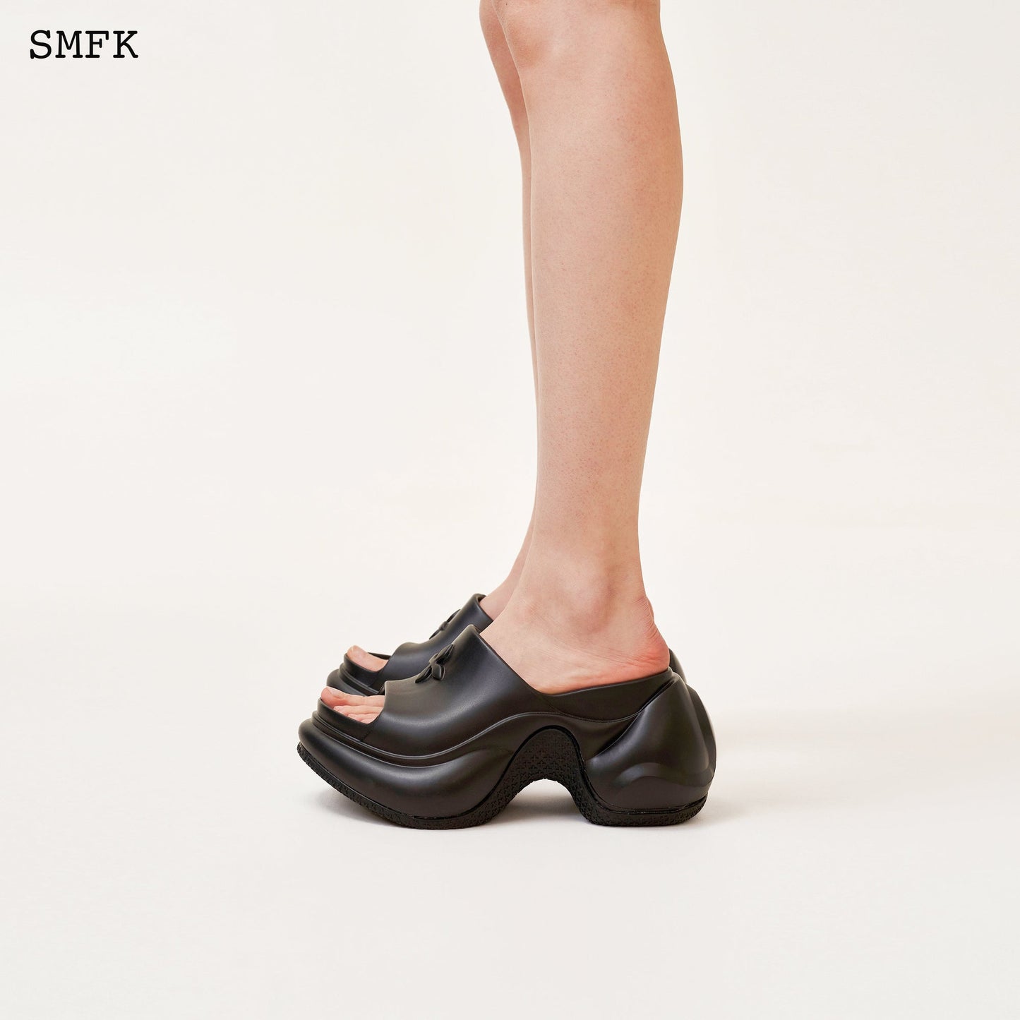 Compass Wave High Heel Bumper Sandal In Black