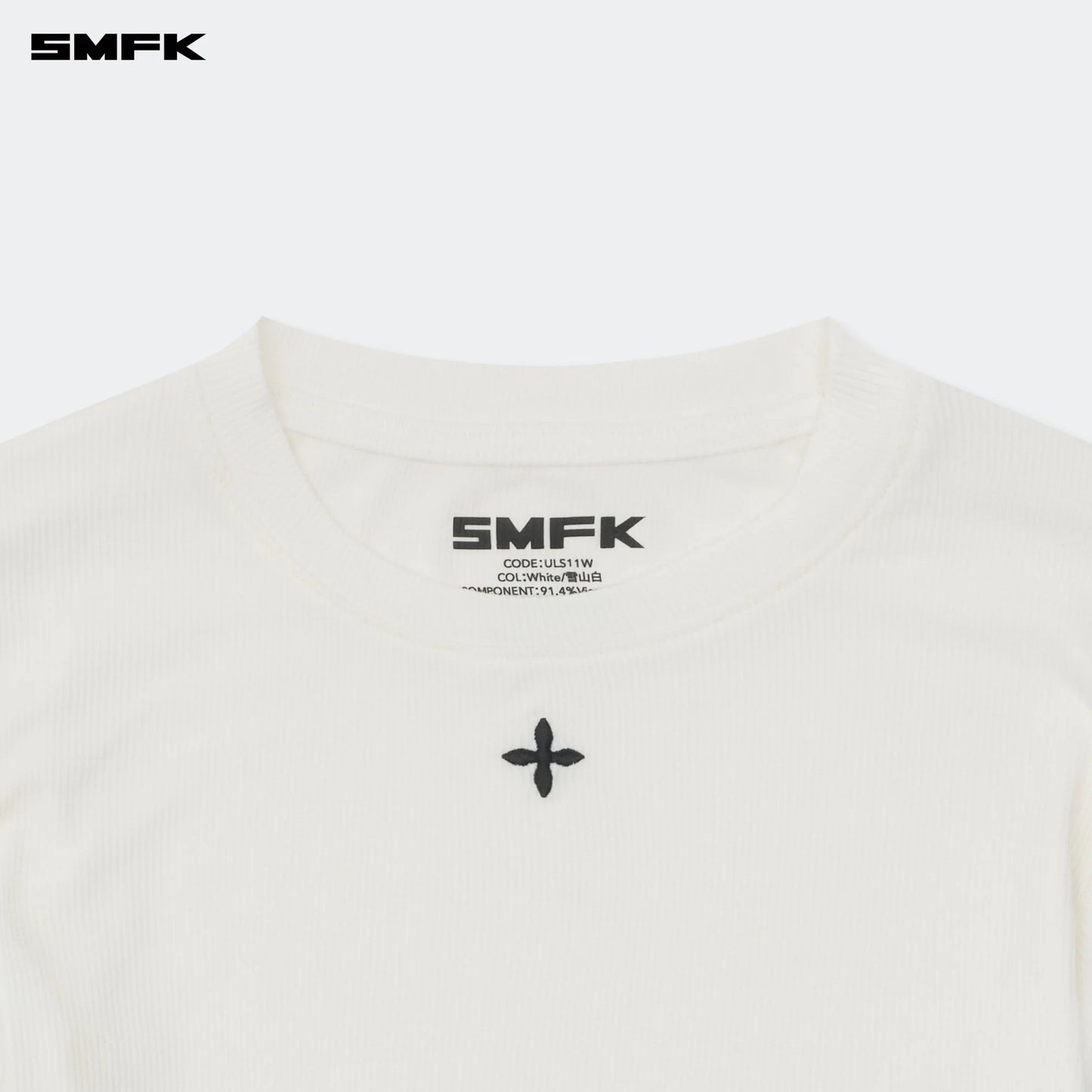 SMFK COMPASS HUG TIGHT SPORTS TOP IN WHITE